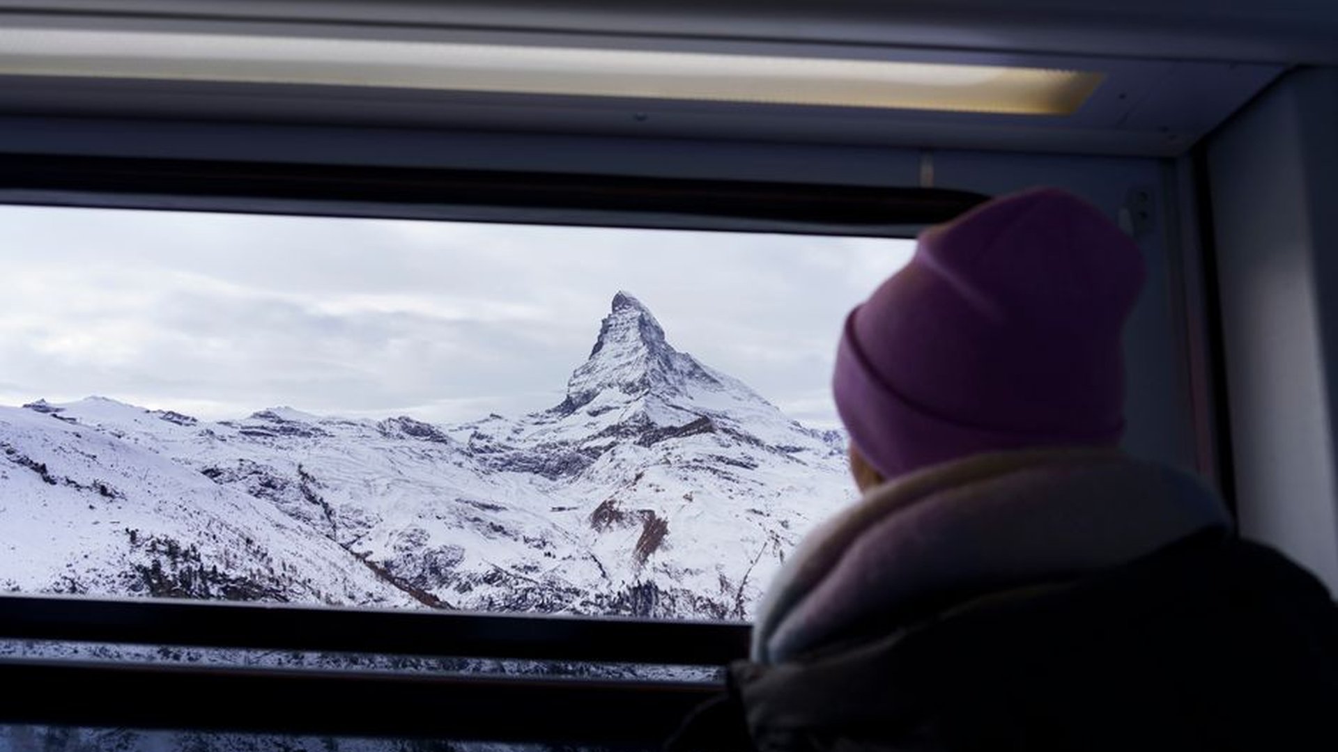 Swiss mountain train window view alpine landscape