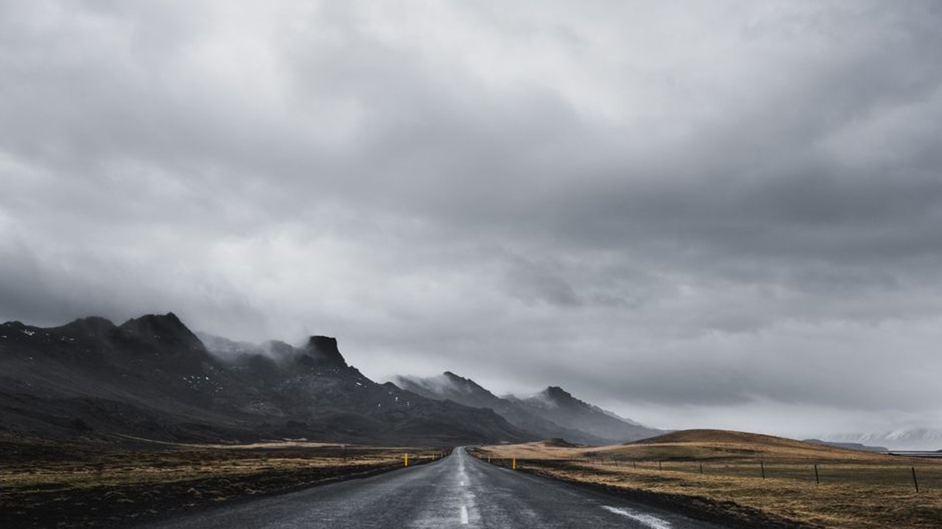 Iceland highlands foggy road rugged terrain remote